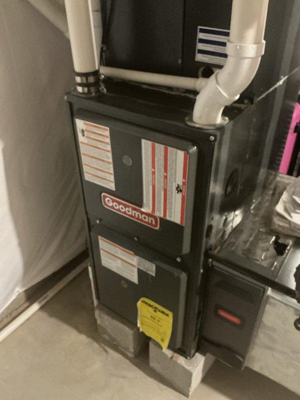 Completed comprehensive AC tune-up on Goodman system with outdoor condenser unit and indoor furnace. Performed standard maintenance inspection, verified proper operation of all components, and documented equipment condition through photos of both indoor and outdoor units.