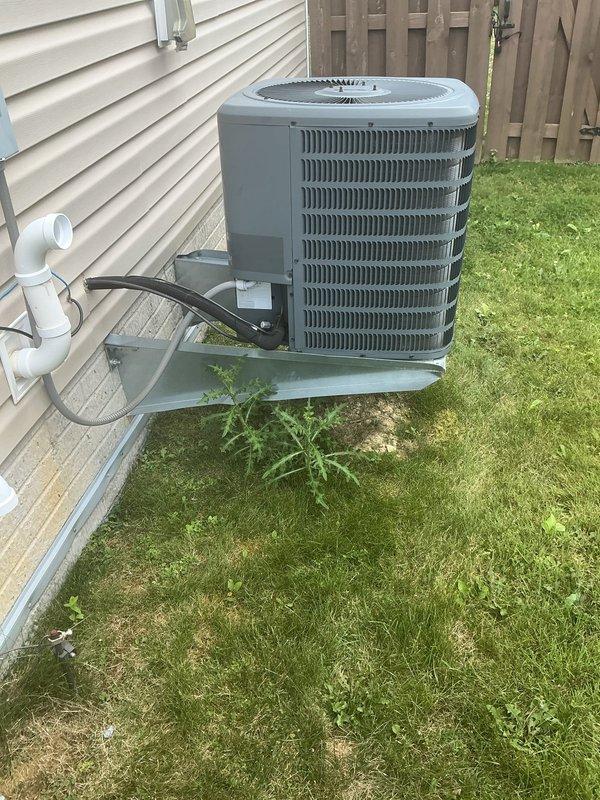 Completed comprehensive AC tune-up on Goodman system with outdoor condenser unit and indoor furnace. Performed standard maintenance inspection, verified proper operation of all components, and documented equipment condition through photos of both indoor and outdoor units.