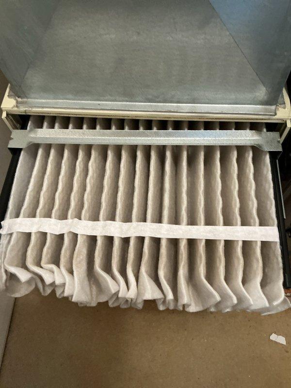 Completed MVP cooling maintenance visit on two 16-year-old air conditioning units. Inspected and documented condition of air filtration systems, verified proper filter installation and cleanliness, and examined condensate drain lines and equipment connections. All components photographed for service records, with systems found operating within normal parameters for units of this age.