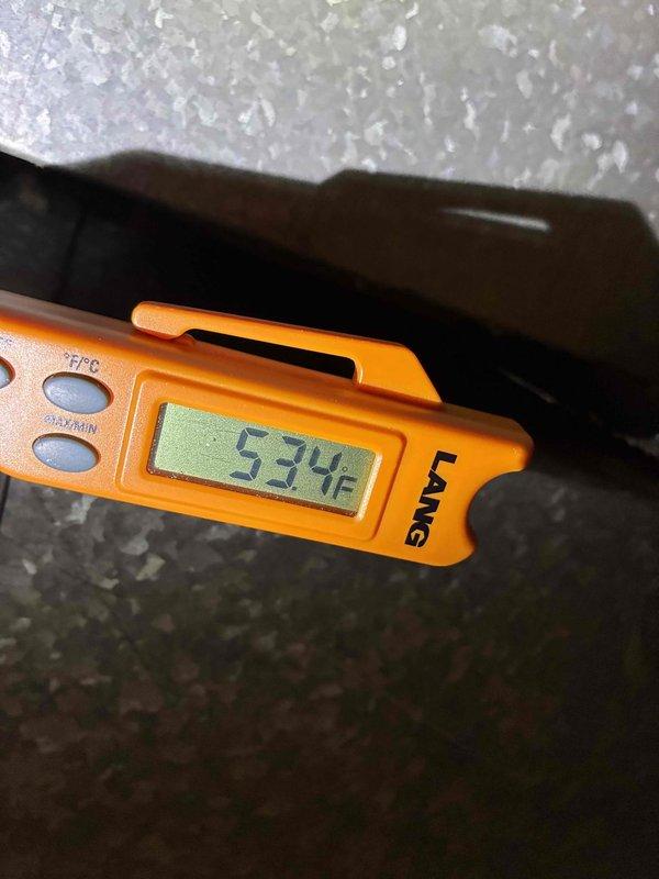 Completed MVP cooling maintenance visit on 2-year-old air conditioning system. Performed standard preventive maintenance inspection, checked electrical connections and contactor operation within disconnect panel, and verified system performance with supply air temperature reading of 53.4°F. All components found operating within normal parameters with no issues identified.