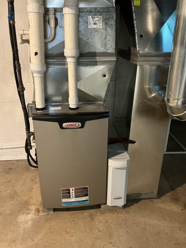 Completed routine maintenance visit on 15-year-old residential cooling system for MVP customer. Performed standard inspection of indoor Lennox furnace unit and outdoor Trane condenser, verified proper operation of all components, and documented system condition with photos. Left message to reschedule follow-up appointment as customer was not available during initial visit.