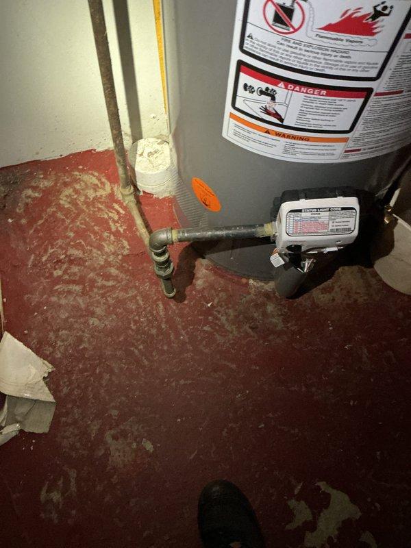 Responded to no water complaint at residential property. Upon arrival, inspected main water supply system and located main shut-off valves in basement area. Found both main water supply valves in closed position, preventing water flow throughout the home. Opened main shut-off valves to restore full water service to the property. Verified water pressure and flow at multiple fixtures to confirm system operation. Inspected water heater connections and supply lines for any signs of leaks or damage. All plumbing connections and fixtures found to be in proper working condition with no leaks detected. Water service fully restored to residence.