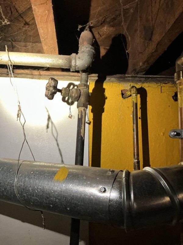 Responded to no water complaint at residential property. Upon arrival, inspected main water supply system and located main shut-off valves in basement area. Found both main water supply valves in closed position, preventing water flow throughout the home. Opened main shut-off valves to restore full water service to the property. Verified water pressure and flow at multiple fixtures to confirm system operation. Inspected water heater connections and supply lines for any signs of leaks or damage. All plumbing connections and fixtures found to be in proper working condition with no leaks detected. Water service fully restored to residence.