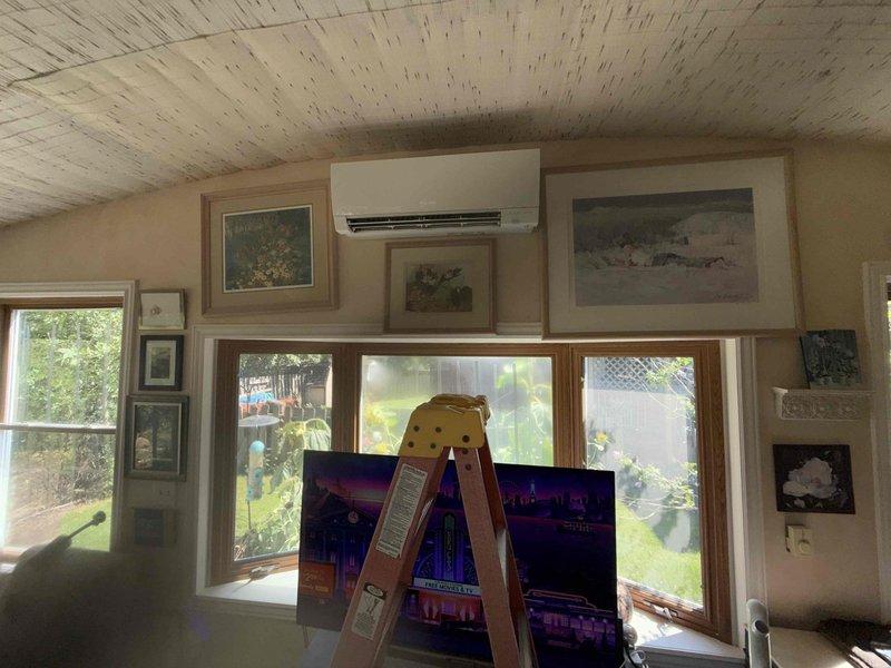 Completed routine maintenance inspection on one-year-old Mitsubishi Electric ductless mini-split system. Verified proper operation of indoor wall-mounted evaporator unit and outdoor condensing unit, confirmed system functionality, and documented equipment condition with photos for service records.