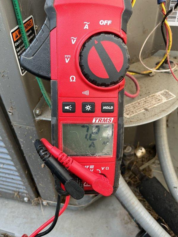 Performed comprehensive tune-up on 6-year-old air conditioning system located in attic space. Inspected all accessible components including air handler unit, ductwork connections, and electrical systems. Measured operating amperage at 12 amps using digital clamp meter to verify proper compressor performance and confirm system is drawing within manufacturer specifications. Cleaned accessible components, checked refrigerant lines and insulation integrity, and verified all electrical connections are secure. System is operating efficiently with no immediate concerns identified.