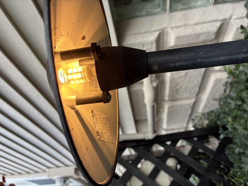 Responded to callback for non-functioning landscape lighting system previously installed by our company. Upon arrival, inspected Hamilton BLR control unit mounted on exterior fence and verified power supply and timer programming. Tested outdoor wall-mounted brass light fixture with active illumination and confirmed proper operation of compact fluorescent bulb. Troubleshot wiring connections at both the control panel and fixture locations, ensuring secure terminations and proper circuit continuity throughout the landscape lighting system.
