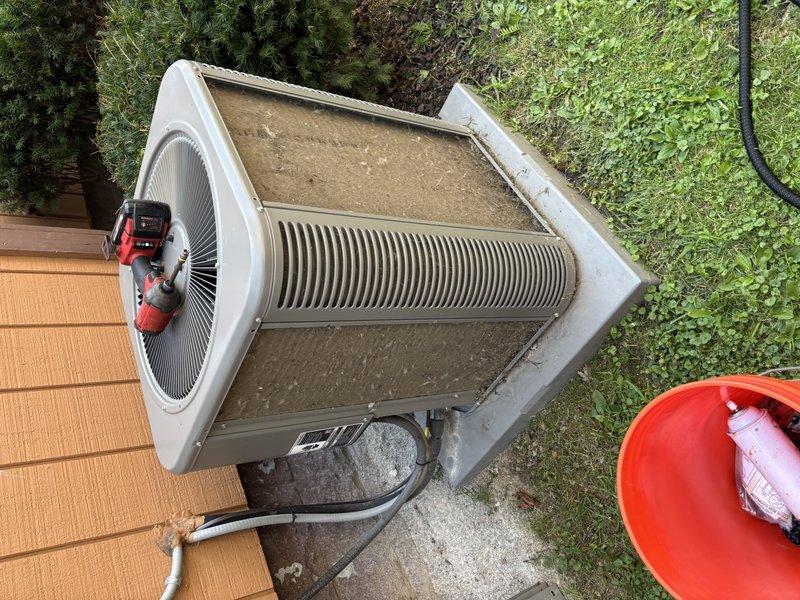 Completed preventive maintenance cooling visit on 5-year-old residential air conditioning system. Performed comprehensive inspection of outdoor condenser unit, checked refrigerant lines and electrical connections, tested system operation and airflow, and documented equipment condition with photos. Unit operating within normal parameters upon service completion.