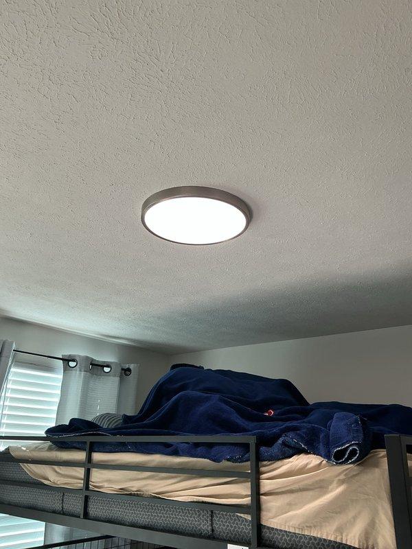 Installed new electrical wiring and junction boxes for ceiling-mounted light fixtures in two bedrooms. Reconfigured existing switched outlet circuits to provide constant power to all receptacles, eliminating switch control. Installed flush-mount LED light fixtures with bronze trim in both rooms, ensuring proper illumination and updated functionality per specifications.