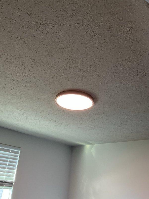 Installed new electrical wiring and junction boxes for ceiling-mounted light fixtures in two bedrooms. Reconfigured existing switched outlet circuits to provide constant power to all receptacles, eliminating switch control. Installed flush-mount LED light fixtures with bronze trim in both rooms, ensuring proper illumination and updated functionality per specifications.