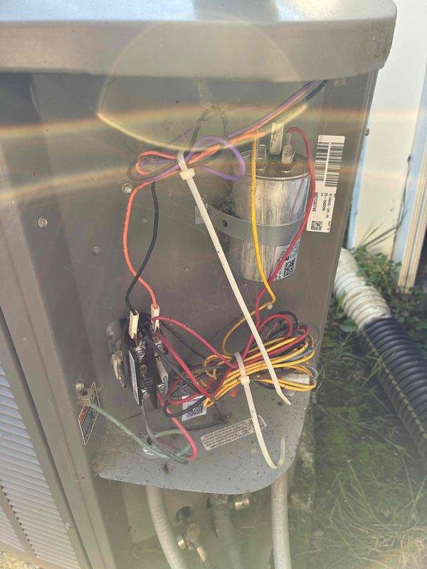 Completed comprehensive spring maintenance on a 4-year-old air conditioning system. Performed standard tune-up procedures including inspection of electrical control panel and capacitor, verified all wire connections and terminals were secure, and checked system temperatures with readings at 57°F. All components operating within normal parameters with no issues identified during routine service.