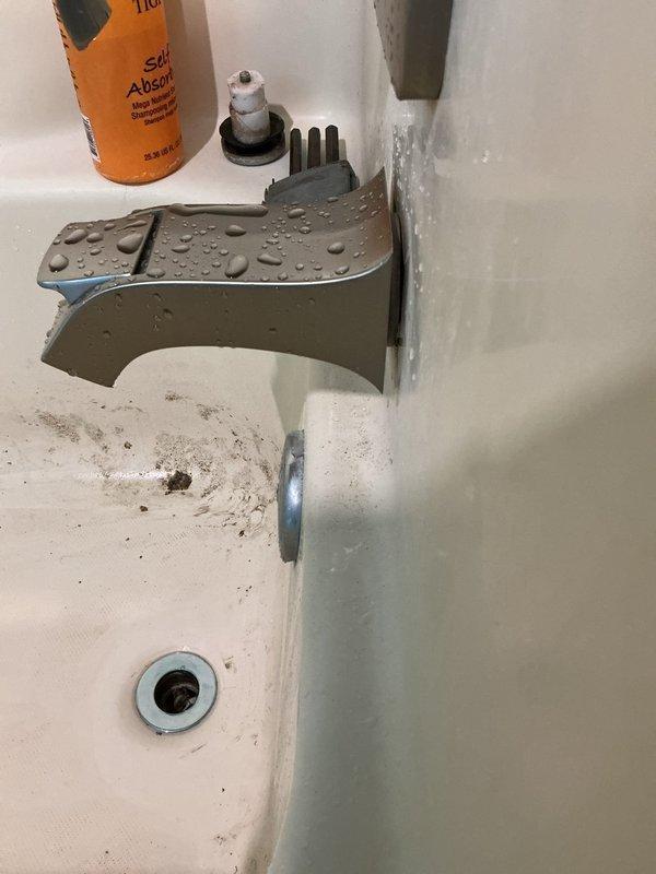 Responded to service call for non-functioning shower and toilet fill issue in 40-year-old residence. Upon arrival, inspected bathroom plumbing fixtures and identified faulty shower valve cartridge requiring replacement. Removed old cartridge, installed new unit, and tested water flow to ensure proper hot and cold water mixing and pressure. Examined toilet fill valve mechanism and found worn flapper and defective fill valve assembly preventing proper tank refill. Replaced fill valve and flapper components, adjusted water level settings, and verified proper flush cycle operation. Inspected exposed plumbing in crawl space, noting PVC supply lines and pump assembly connections showing minor condensation but no active leaks. All fixtures restored to full working condition and tested for proper operation before departure.
