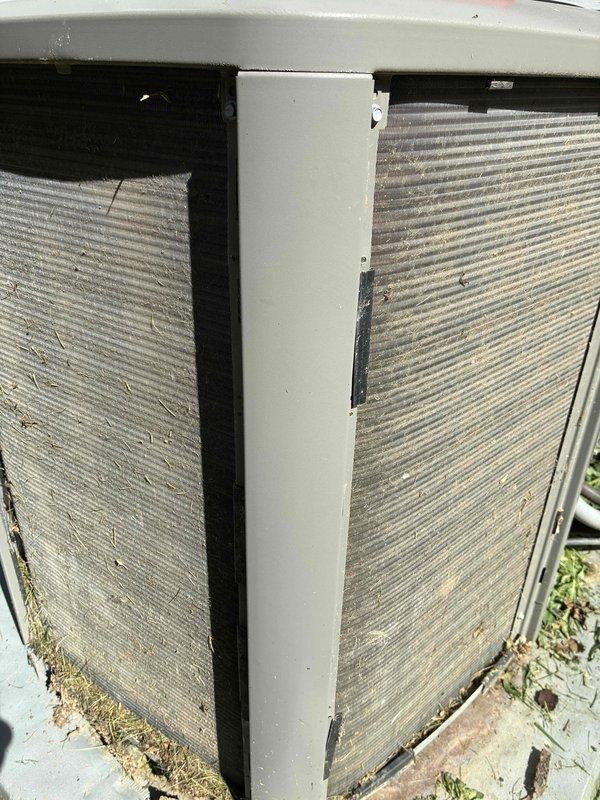 Completed MVP recurring cooling maintenance visit on 4-year-old system. Inspected outdoor unit and found both air filters heavily clogged with dust, dirt, and debris accumulation, restricting airflow. Measured system temperature at 42.7°F using digital multimeter at evaporator coil. Documented filter condition and operational readings for maintenance records.