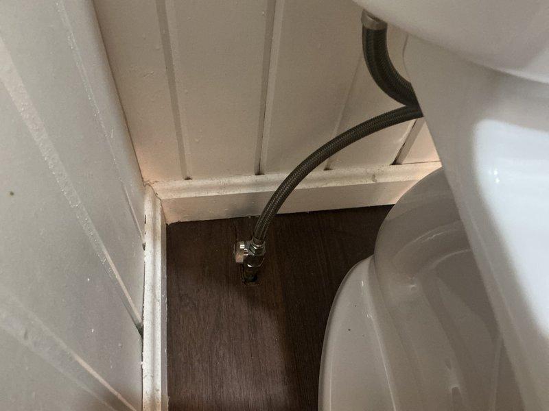 Removed existing toilet and installed new American Standard Champion right height elongated toilet with slow close seat. Replaced existing angle stop with new straight stop valve and connected supply line. Tested flush operation and checked all connections for leaks to ensure proper functionality.