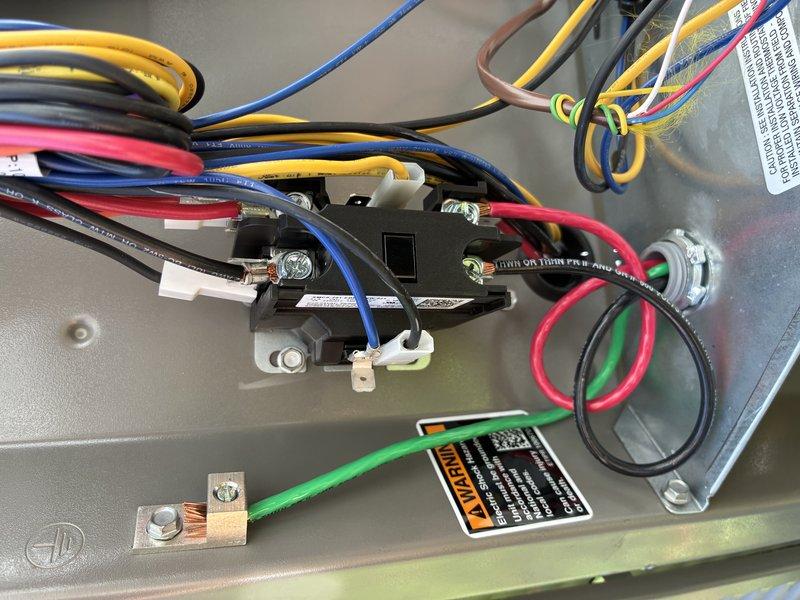 Installed dedicated electrical circuit for Lennox ML17XC1-036-230A02 air conditioning unit. Ran new wiring from electrical panel to exterior condensing unit, terminated all connections at equipment disconnect and unit control board, and verified proper voltage supply within manufacturer specifications of 197-253V. All electrical connections secured with appropriate wire nuts and terminals, grounding conductor properly bonded to equipment chassis per NEC requirements.