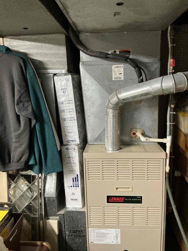 Responded to no cooling condition on residential HVAC system that failed earlier in the week. Conducted comprehensive assessment of existing Lennox furnace and air conditioning components in basement mechanical room. Evaluated system age, efficiency, and extent of failure to determine repair versus replacement options. Prepared detailed estimate for complete HVAC system replacement including new furnace, air conditioning unit, and associated ductwork modifications as needed. Documented existing equipment configuration and installation environment with photographs for estimate preparation and customer review.