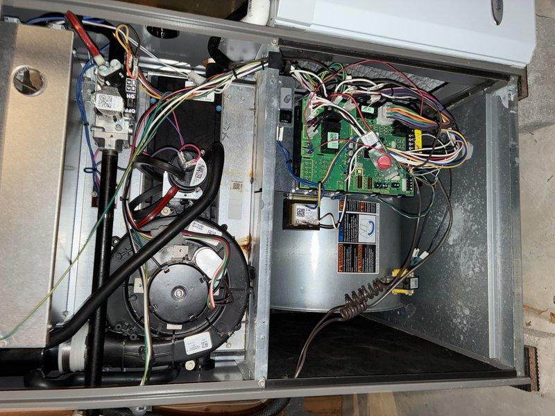 Completed MVP recurring cooling maintenance visit on residential HVAC system. Performed comprehensive inspection of air handler unit, verifying proper operation of dual blower motors, control board functionality, and capacitor condition. Documented significant rust and corrosion present on exterior copper refrigerant lines at condensing unit, which will require monitoring for potential refrigerant leaks and future line replacement to prevent system failure.