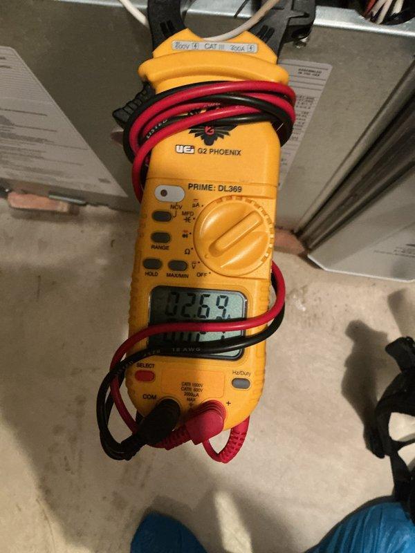 Completed MVP Cooling Visit maintenance on a 3-year-old HVAC system. Inspected evaporator coil assembly and verified electrical readings at 236.59 volts using digital multimeter. Initial appointment rescheduled due to high demand, with follow-up maintenance visit scheduled for completion.