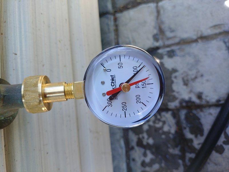 Responded to service call for loud banging noise occurring after toilet flush cycle completion. Installed new toilet as requested and diagnosed water hammer condition in supply line. Tested static water pressure using calibrated gauge, measuring approximately 125 PSI, which exceeds recommended residential range and explains hydraulic shock causing banging sounds when fill valve closes abruptly.