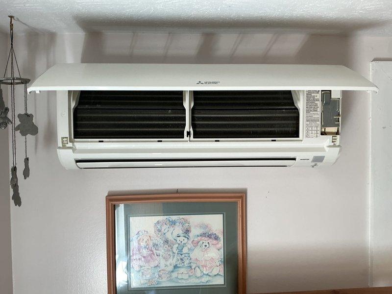 Completed MVP cooling maintenance visit on three Mitsubishi ductless mini-split indoor units located in attic, master bedroom, and dining room. Removed and cleaned evaporator coils, inspected blower wheels, verified proper operation of all heads, and documented system condition with photos.