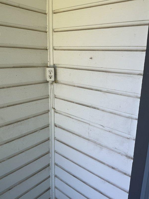 Responded to service call for GFCI outlet installation. Successfully installed three GFCI outlets as requested: two in kitchen area and one on side porch using surface-mounted conduit along wall corner with appropriate weatherproof box. Additionally addressed fluorescent light fixture that had become detached from ceiling mount in hallway, securing fixture properly and restoring safe operation.