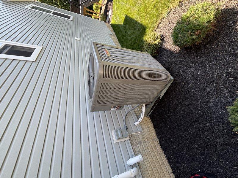 Completed MVP recurring cooling maintenance visit on residential air conditioning system. Performed comprehensive inspection of outdoor condenser unit, documented equipment condition with photographs showing significant dirt and debris accumulation on heat exchanger coil fins requiring attention. Unit operational and accessible on exterior concrete pad with proper drainage and clearances maintained.