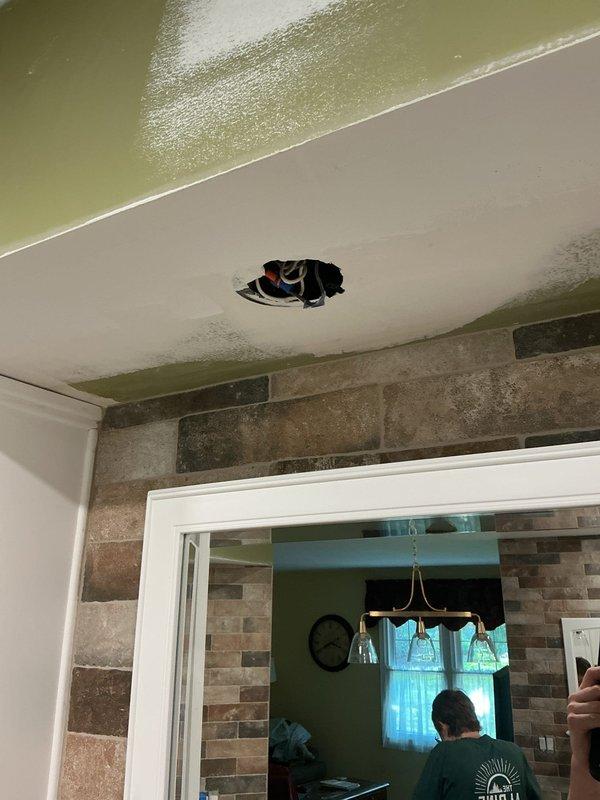 Completed installation of interior light fixtures and exterior walkway lighting for residential property. Work included mounting new fixture in interior ceiling space with proper wiring connections through access hole, and installing outdoor walkway lights on exterior of home. Verified all electrical connections were secure, tested fixtures for proper operation, and ensured installations met code requirements for both indoor and outdoor applications.