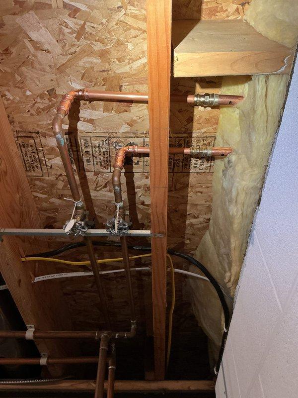 Replaced multiple exterior hose bibs (sillcocks) including garage hot and cold water supply lines and front side exterior faucet. Installed new copper piping, shut-off valves, and freeze-proof sillcocks to restore proper water distribution to outdoor fixtures, with all connections tested and verified leak-free.