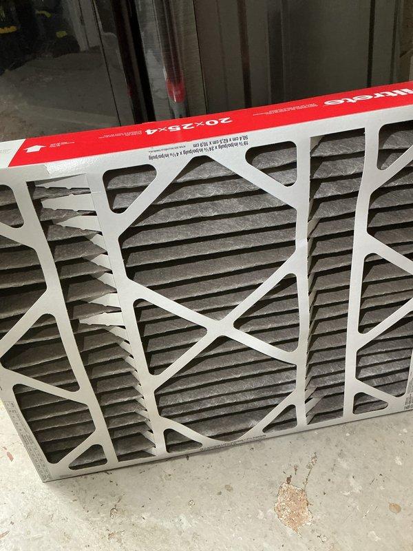 Completed MVP cooling maintenance visit on system 16 years or older. Inspected and photographed 20x25x4 air filter showing dust accumulation and replaced as needed. Examined blower wheel assembly, noting dust buildup on blades and housing with visible wear patterns consistent with system age. Verified blower motor operation and airflow performance within acceptable parameters for continued system operation.