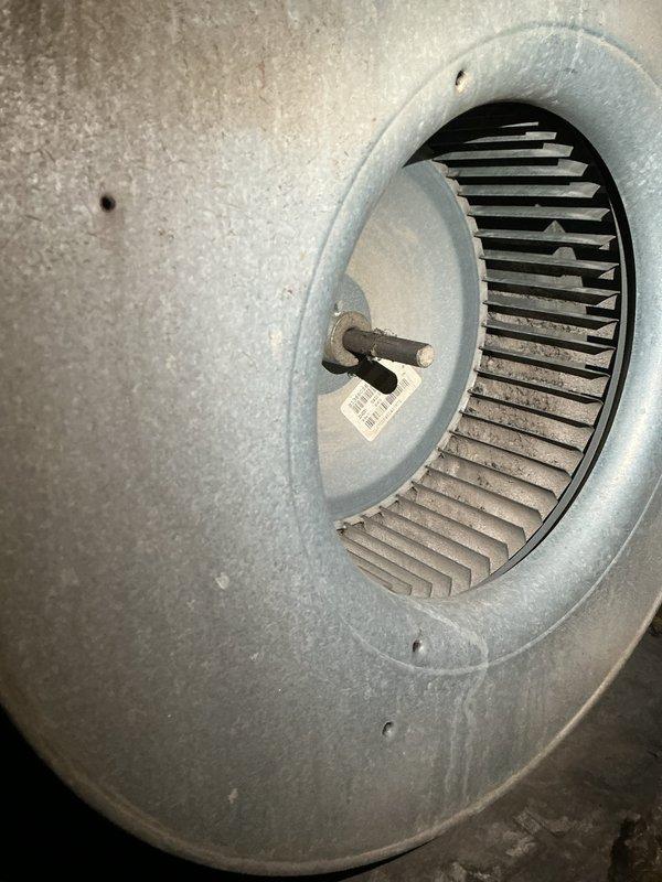 Completed MVP cooling maintenance visit on system 16 years or older. Inspected and photographed 20x25x4 air filter showing dust accumulation and replaced as needed. Examined blower wheel assembly, noting dust buildup on blades and housing with visible wear patterns consistent with system age. Verified blower motor operation and airflow performance within acceptable parameters for continued system operation.