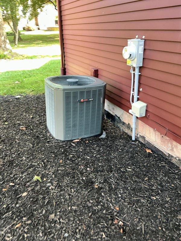 Completed scheduled MVP cooling maintenance visit on residential air conditioning system. Performed comprehensive inspection of outdoor condensing unit, verified proper operation of all components, checked electrical connections at disconnect box and conduit assembly, and documented equipment condition through photographic records. Unit found operating within normal parameters with no immediate service needs identified.