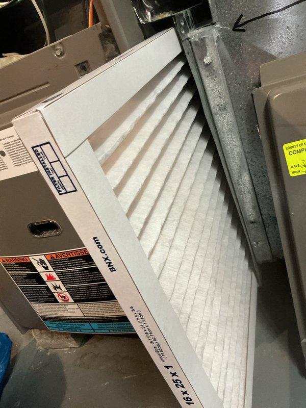 Completed preventive maintenance service on a 6-year-old residential air conditioning system for enrolled maintenance plan customer. Performed comprehensive inspection of indoor air handler unit, confirming clean pleated air filter in place with proper airflow. Connected manifold gauge set to outdoor condensing unit to evaluate system refrigerant pressures and verify proper charge levels. All components operating within normal parameters with no deficiencies noted during inspection.