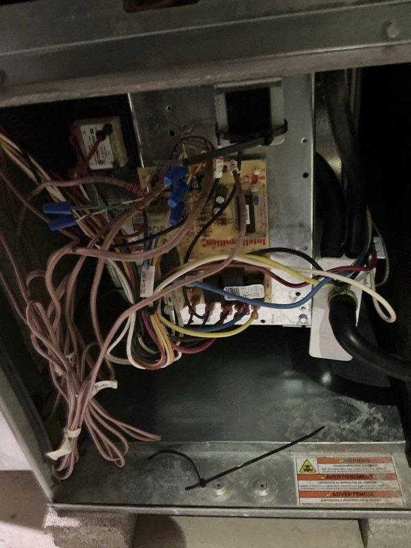Completed MVP cooling maintenance visit on 9-year-old residential air conditioning system. Performed comprehensive inspection of outdoor condensing unit, accessing internal electrical components and control board to verify proper operation. Inspected wiring connections, capacitor, and control circuitry for signs of wear or failure. All electrical connections found secure and system operating within normal parameters for unit age.