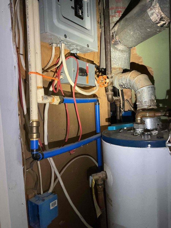 Conducted on-site assessment for home generator installation. Evaluated existing electrical service panel, meter location, and available utility infrastructure in basement mechanical room. Documented current electrical configuration including main service entrance, panel capacity, and potential transfer switch mounting locations. Assessed gas line accessibility and clearance requirements for generator placement. Photographed existing electrical meter setup on exterior wall and interior mechanical room to determine optimal integration points for automatic transfer switch and generator connection. Provided comprehensive evaluation for whole-home standby generator system installation.