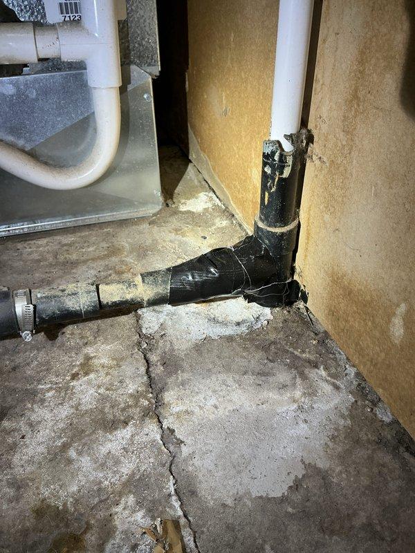 Responded to service call for minor water leaks in residential plumbing system. Inspected and repaired leaking black PVC pipe assembly in basement utility area, which had been previously wrapped with tape and secured with hose clamp. Applied proper sealing methods to eliminate leak source contributing to mold development. Examined HVAC system and ductwork in mechanical room, including Lennox furnace and water heater connections. Assessed dryer vent system for potential cleaning requirements and provided recommendations for maintenance to prevent future moisture accumulation and ensure proper ventilation.