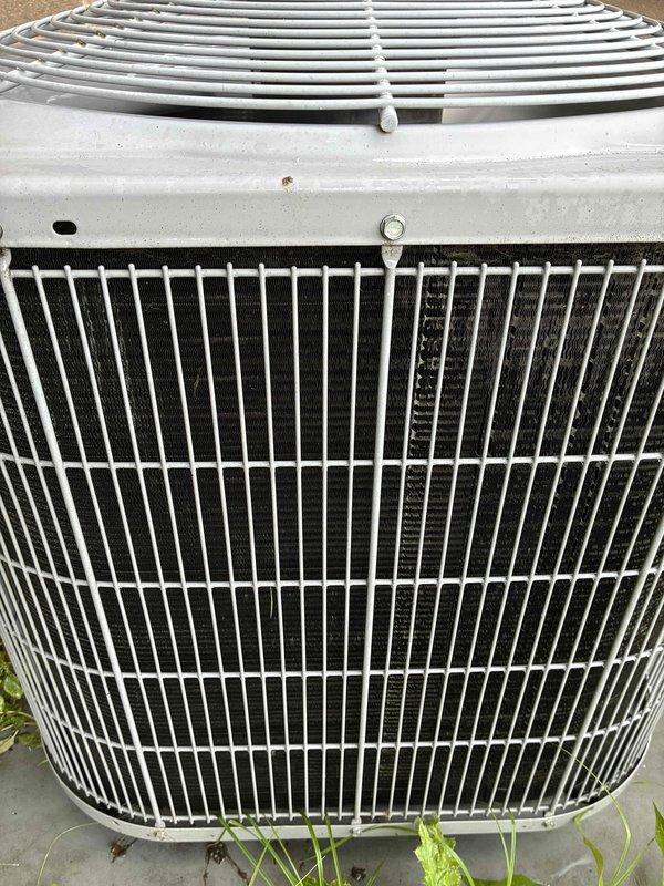Completed scheduled MVP cooling maintenance visit on residential outdoor condensing unit. Performed comprehensive system inspection, verified proper operation of compressor and condenser fan motor, checked refrigerant levels, cleaned condenser coils, and confirmed adequate airflow through protective grilles. Unit found in good working condition with all components functioning within normal parameters.