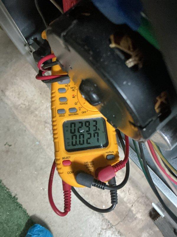 Completed scheduled cooling system maintenance visit on a 6-year-old air conditioning unit. Performed diagnostic testing using digital multimeter to measure electrical readings on motor/capacitor assembly, recording values of 42.93 and 0.020 ohms. Conducted temperature measurements in the mechanical space, documenting ambient conditions at 52.8 degrees. All critical components inspected and system found operational.