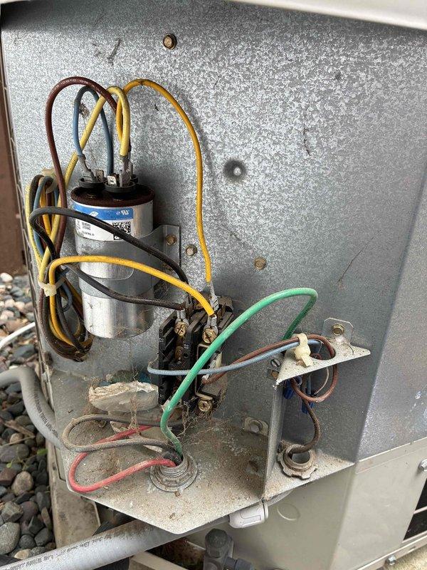 Performed routine AC tune-up on residential outdoor condenser unit. Completed comprehensive system inspection including electrical components, capacitor testing, and cleaning of unit. All components found in good working order with no issues identified; system operating within normal parameters.