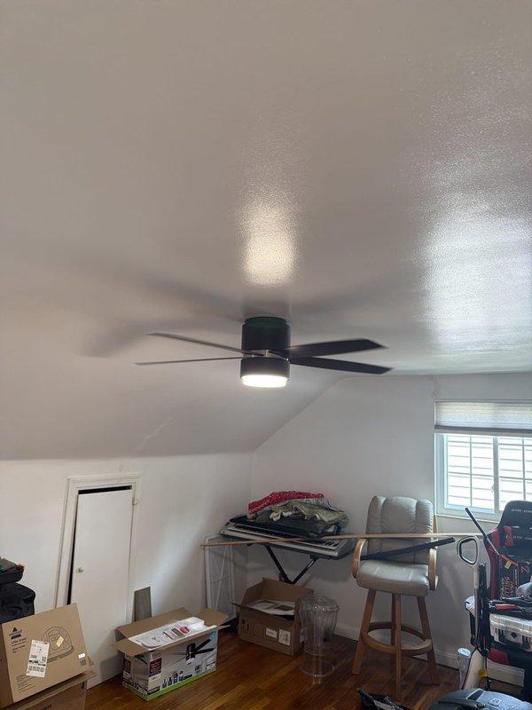 Successfully removed two existing ceiling fans and installed two customer-supplied replacement units in residential attic space and secondary room. Both installations included mounting new fan assemblies to existing electrical boxes, securing blades, and connecting integrated LED light fixtures. Verified proper operation of all fan speeds and lighting functions upon completion.