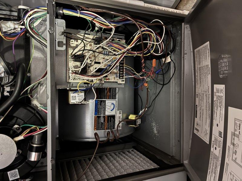 Completed scheduled cooling maintenance on residential outdoor HVAC unit. Performed comprehensive system inspection including examination of condenser coil, electrical components, control board, wiring connections, and blower motor assembly. All components found to be in proper working order with normal operational wear, system tested and confirmed operating within manufacturer specifications.