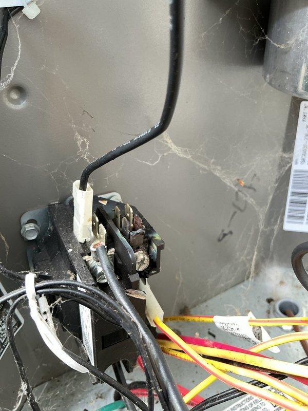 Responded to no cooling complaint with rising indoor temperature. Upon inspection, found corroded electrical connections at contactor assembly causing intermittent power delivery to compressor. Cleaned terminal connections, verified proper wire seating, and tested system operation. Unit now cooling properly with thermostat responding correctly to temperature setpoint.