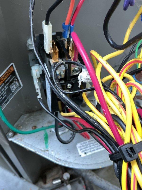 Responded to no cooling complaint with rising indoor temperature. Upon inspection, found corroded electrical connections at contactor assembly causing intermittent power delivery to compressor. Cleaned terminal connections, verified proper wire seating, and tested system operation. Unit now cooling properly with thermostat responding correctly to temperature setpoint.