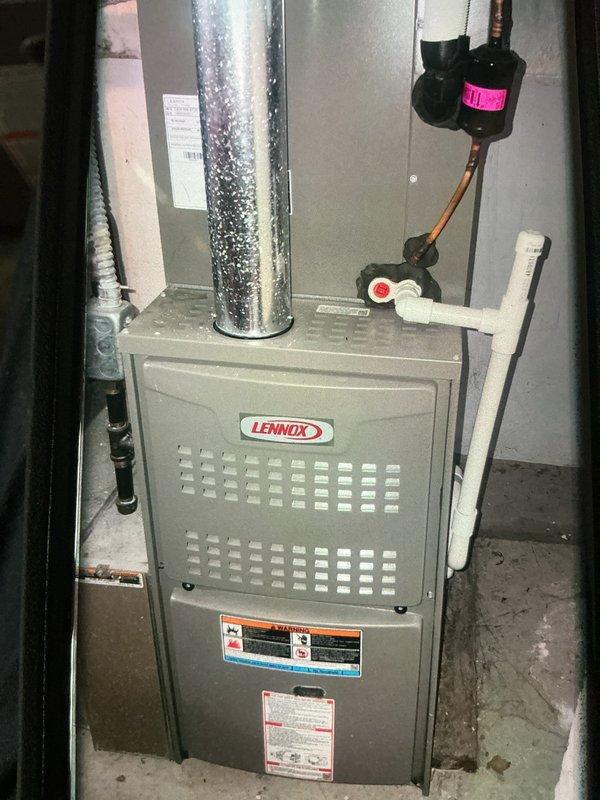Completed MVP recurring cooling maintenance visit on 4-year-old Lennox HVAC system. Inspected furnace unit, ductwork, refrigerant lines, electrical components including capacitor and contactor, and verified proper system operation. Documented equipment condition with photos showing normal wear and minor debris accumulation in outdoor unit; all components functioning within normal parameters.
