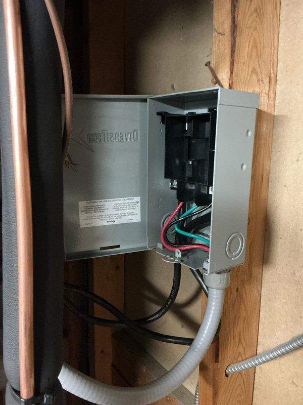 Installed electrical panel and wiring for air handler unit with two dedicated 20-amp circuits to provide temporary cooling capability. Ran conduit from new panel box, terminated all circuit wiring to breakers and neutral bus bar, and verified proper electrical connections for safe operation pending final inspection confirmation.