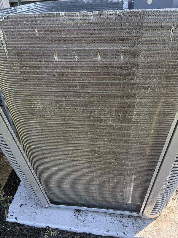 Completed standard air conditioning tune-up on 3-year-old residential system. Inspected outdoor condenser unit, noting accumulated debris and dirt between coil fins that was affecting heat transfer efficiency; cleaned coil surfaces to restore optimal airflow and performance. Verified indoor air handler components, checked refrigerant lines and insulation integrity, and confirmed proper condensate drainage through PVC lines, with all system parameters operating within manufacturer specifications.