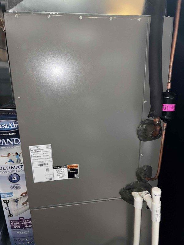 Completed standard air conditioning tune-up on 3-year-old residential system. Inspected outdoor condenser unit, noting accumulated debris and dirt between coil fins that was affecting heat transfer efficiency; cleaned coil surfaces to restore optimal airflow and performance. Verified indoor air handler components, checked refrigerant lines and insulation integrity, and confirmed proper condensate drainage through PVC lines, with all system parameters operating within manufacturer specifications.