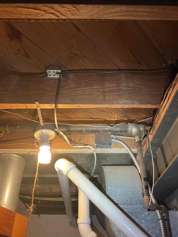 Completed electrical estimate for whole-house generator installation at residential property. Assessed existing electrical panel configuration, available breaker capacity, and main service specifications to determine generator transfer switch requirements. Evaluated attic utility space for potential transfer switch mounting location and reviewed routing options for generator feed conductors. Documented current electrical infrastructure including panel layout, available knockout locations, and proximity to exterior wall penetration points for generator connection. Photographed existing electrical distribution system and proposed installation pathway to provide comprehensive documentation for generator system design and material specifications.