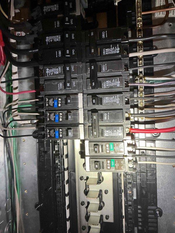 Completed electrical estimate for whole-house generator installation at residential property. Assessed existing electrical panel configuration, available breaker capacity, and main service specifications to determine generator transfer switch requirements. Evaluated attic utility space for potential transfer switch mounting location and reviewed routing options for generator feed conductors. Documented current electrical infrastructure including panel layout, available knockout locations, and proximity to exterior wall penetration points for generator connection. Photographed existing electrical distribution system and proposed installation pathway to provide comprehensive documentation for generator system design and material specifications.