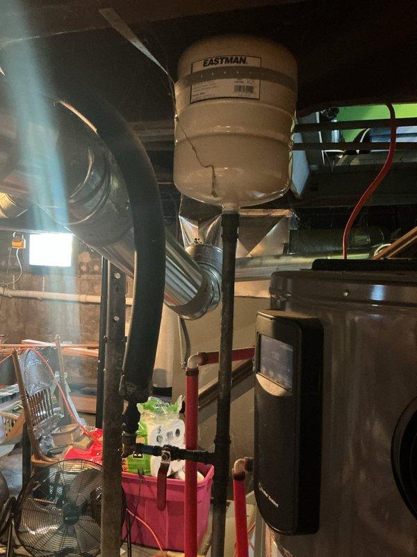 Conducted on-site evaluation for replacement of existing 50-gallon natural gas tanked water heater in basement utility area. Assessed current installation, including water supply connections with copper piping, gas line accessibility, and venting configuration. Documented existing equipment condition and surrounding mechanical systems to determine proper replacement specifications and installation requirements. Customer availability confirmed for scheduling installation work.