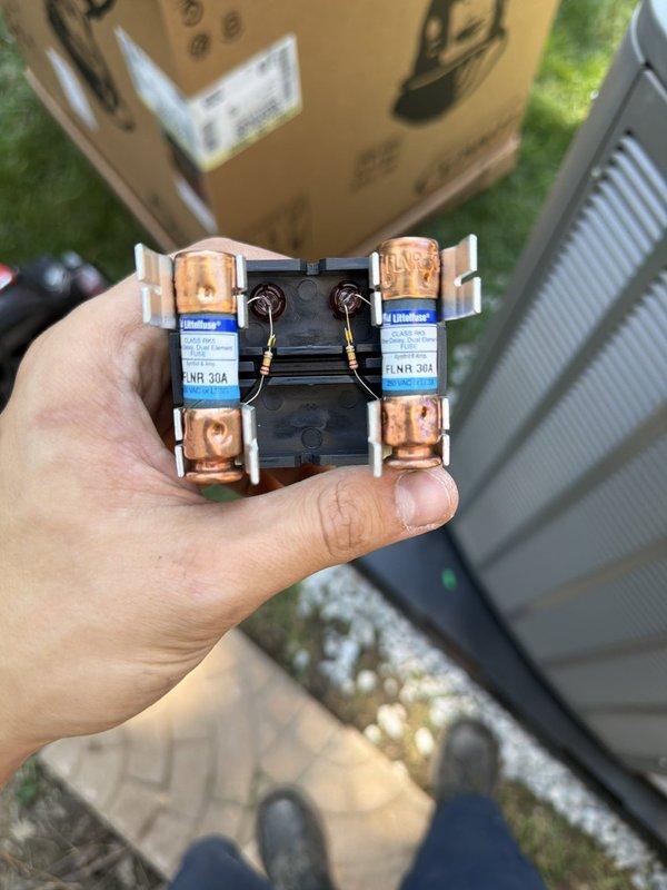 Completed full HVAC system installation including 90% efficiency furnace, air conditioning condenser unit, and humidifier following warranty service call. Installed Lennox brand outdoor condensing unit on rubber isolation pad with proper gravel base for drainage, mounted refrigerant lines to exterior wall with secure brackets, and replaced 30-amp Littelfuse disconnect assembly. System commissioned and verified operational with all components functioning to manufacturer specifications.