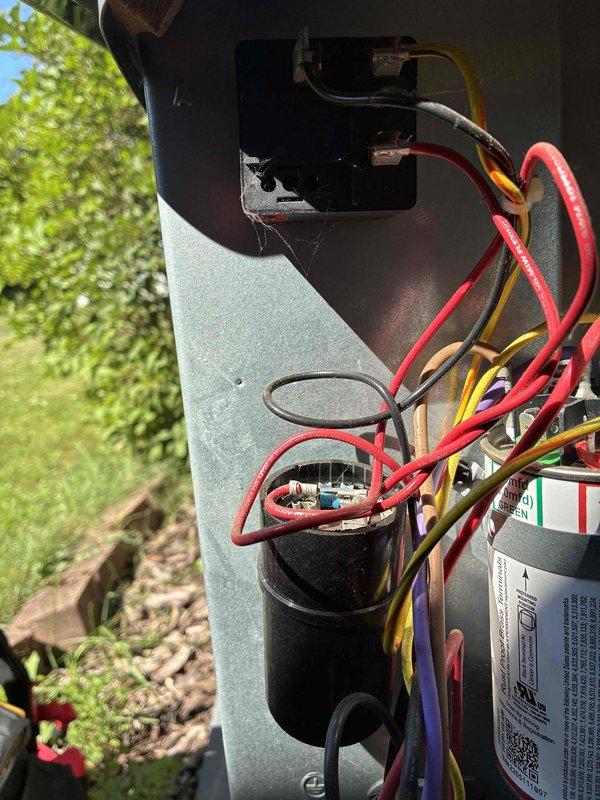 Completed BS-MVP cooling maintenance visit on 7-year-old outdoor unit. Removed and documented severely clogged air filter with extensive dirt and debris accumulation throughout pleated media. Inspected electrical components including capacitor, wiring connections, and control terminals. All electrical connections verified secure with proper color-coded wiring intact. System operational following filter replacement and standard maintenance procedures.